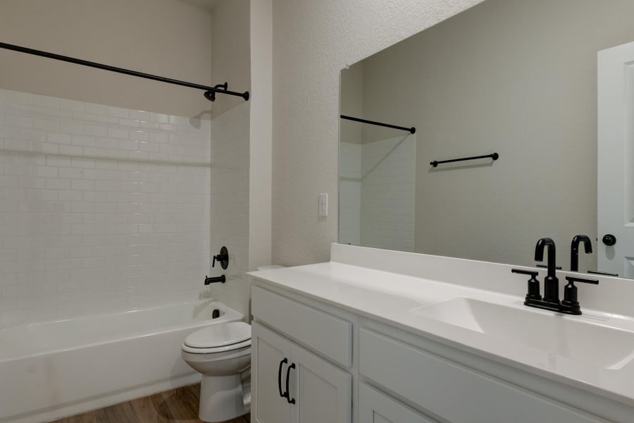 Representative furnished interior of a home built from the Brodie by Ashton Woods in Enclave at Hennersby Hollow 50's, San Antonio (Image 4). Representative furnished interior of a home built from the Brodie by Ashton Woods in Enclave at Hennersby Hollow 50's, San Antonio (Image 4).