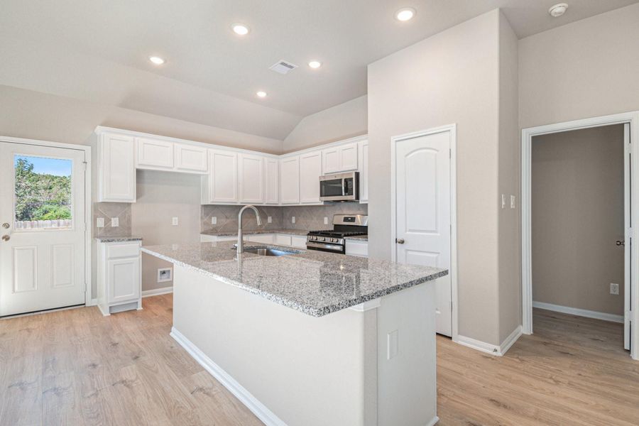 Furnished interior view inside a new home in Clear View Estates, Willis (Image 4).