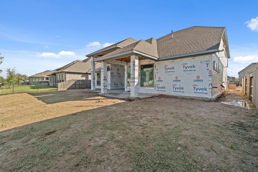 Exterior details and patio area of a home in The Park and The Reserve, Fulshear (Image 3).