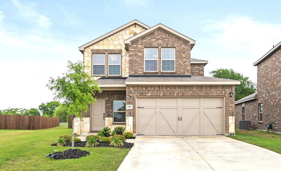 Gorgeous brick and stone facade, and curb appeal that makes a statement from the start Gorgeous brick and stone facade, and curb appeal that makes a statement from the start