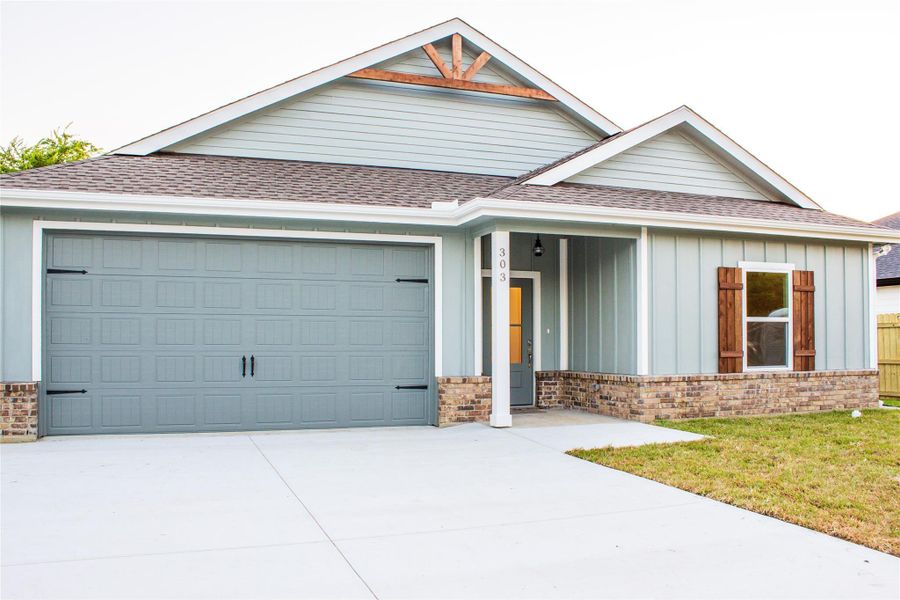 Front exterior of a new home in , Port Neches, TX, highlighting curb appeal (Image 1). Front exterior of a new home in , Port Neches, TX, highlighting curb appeal (Image 1).
