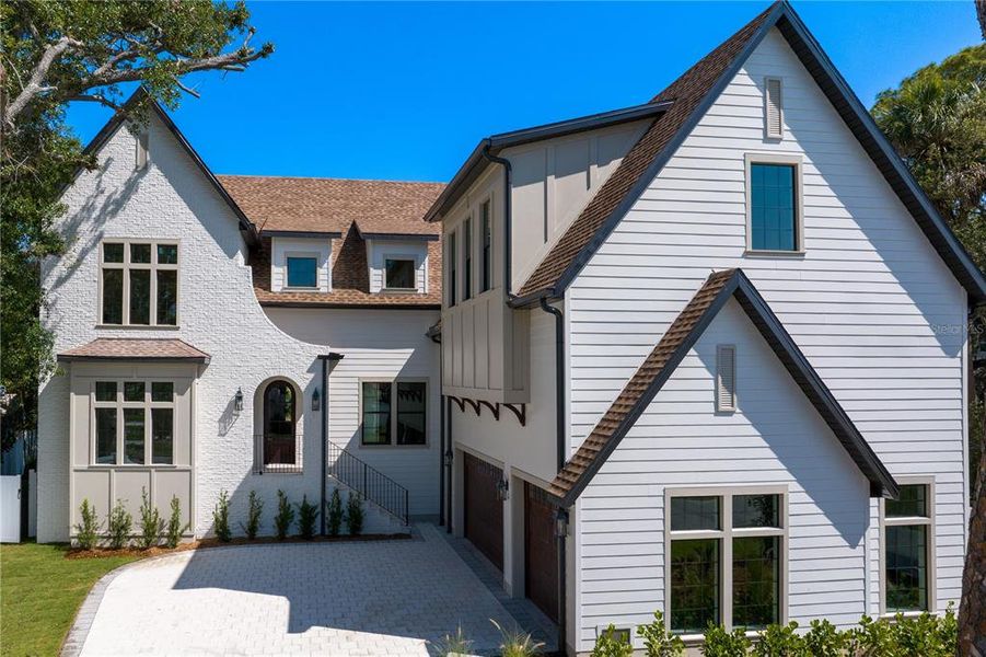 Front exterior of a new home in , Tampa, FL, highlighting curb appeal (Image 23).
