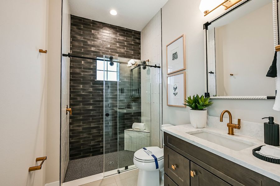 Representative furnished interior of a home built from the Key West II by Homes by WestBay in Oakfield, Parrish (Image 29).