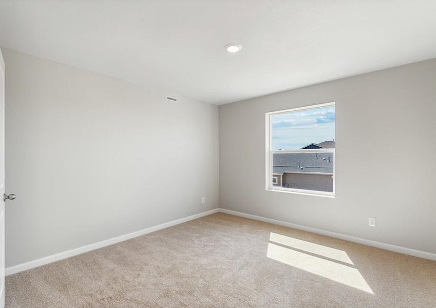 The secondary bedroom has carpet.