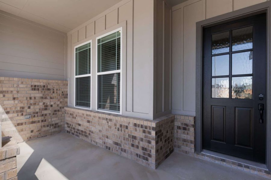 Exterior details and patio area of a home in Lariat, Liberty Hill (Image 3).
