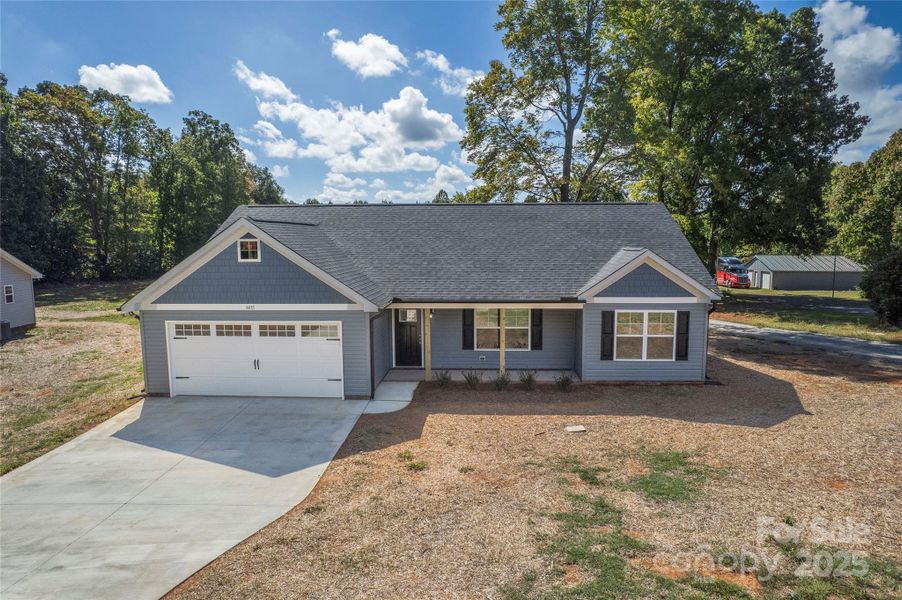 Front exterior of a new home in , Asheboro, NC, highlighting curb appeal (Image 18).