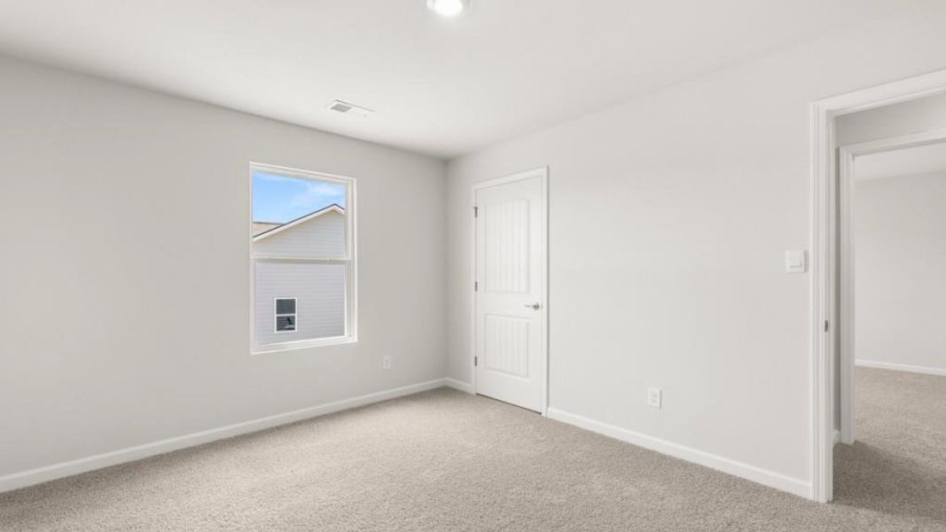 Spacious, unfurnished interior of a new home in Fairway 17 at Mirror Lake, Villa Rica (Image 32).