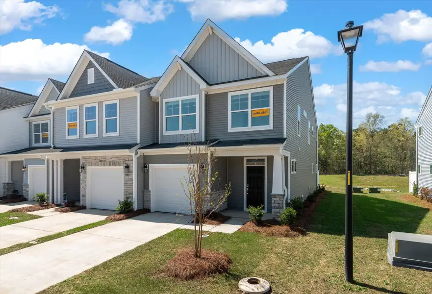 Front exterior of a new home in , Goose Creek, SC, highlighting curb appeal (Image 1). Front exterior of a new home in , Goose Creek, SC, highlighting curb appeal (Image 1).