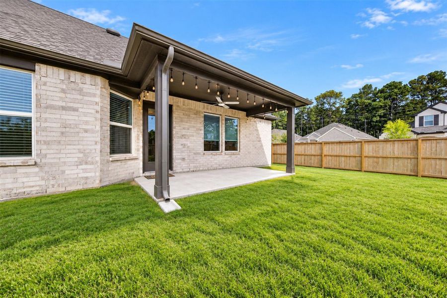 Exterior details and patio area of a home in Sorella, Tomball (Image 18).