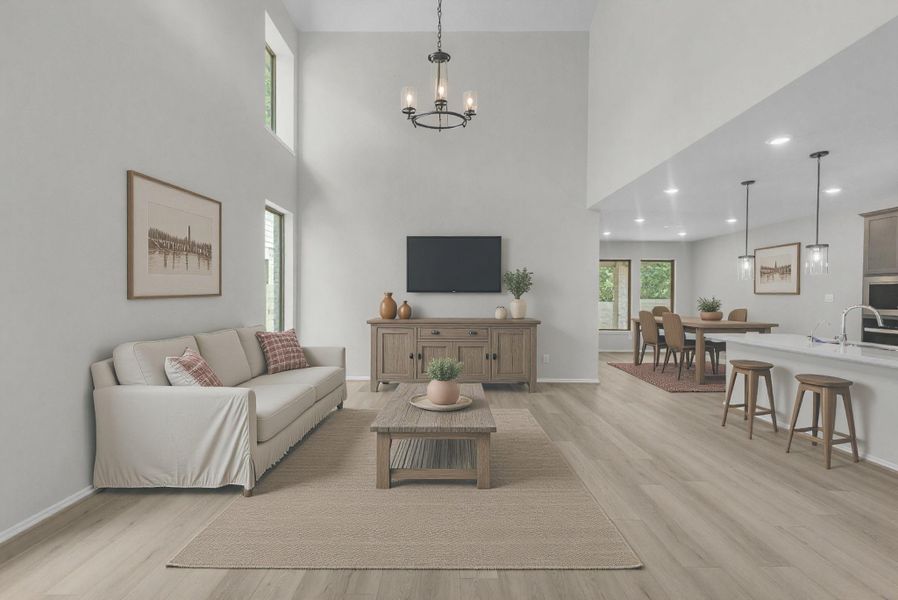 Open-concept with 2-story ceilings in the family room. Virtually staged.
