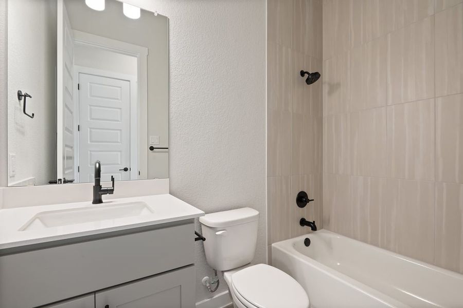 Furnished interior view inside a new home in Arbor Collection At Wolf Ranch, Georgetown (Image 7).