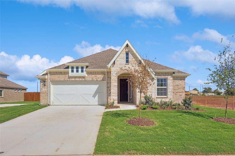 View of front of home with a front yard