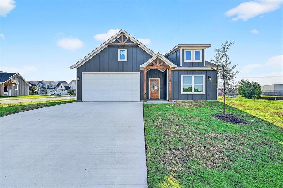 Front exterior of a new home in , Sherman, TX, highlighting curb appeal (Image 19).