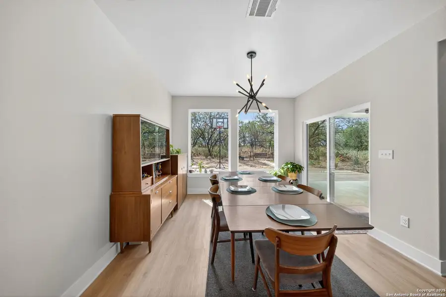 Furnished interior view inside a new home in , Devine (Image 10).