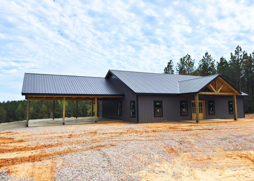Front exterior of a new home in , Lenoir, NC, highlighting curb appeal (Image 4).