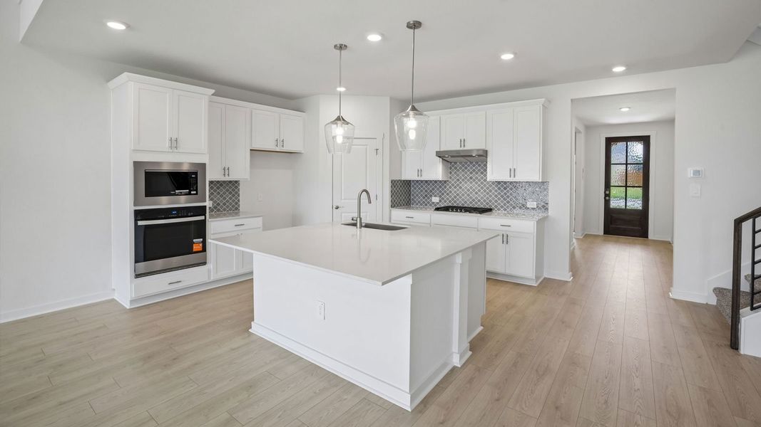 Furnished interior view inside a new home in Rosenbusch Ranch, Leander (Image 6).