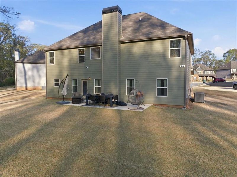 Exterior details and patio area of a home in Nine Oaks, Locust Grove (Image 30).