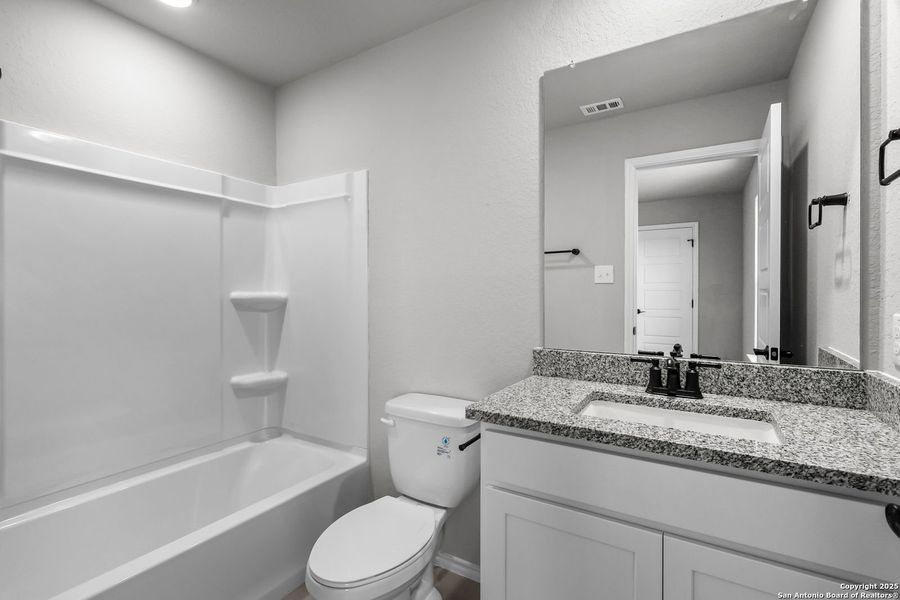 Furnished interior view inside a new home in Comanche Ridge, San Antonio (Image 42). Furnished interior view inside a new home in Comanche Ridge, San Antonio (Image 42).