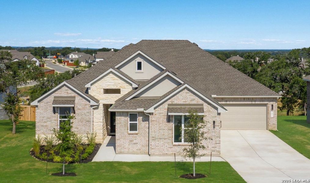 Front exterior of a new home in Arbors at Fair Oaks, Fair Oaks Ranch, TX, highlighting curb appeal (Image 23).
