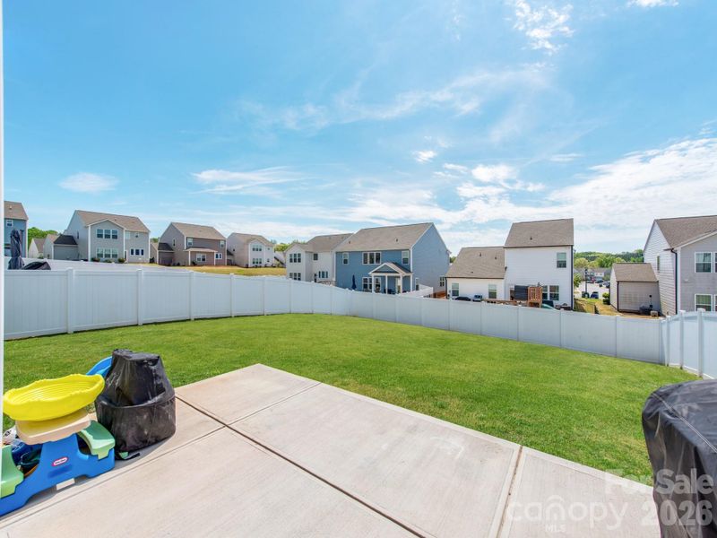 Exterior details and patio area of a home in Sutter's Mill II, Troutman (Image 4).