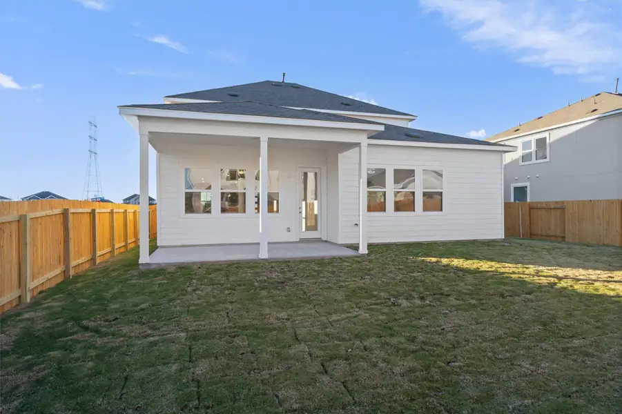 Exterior details and patio area of a home in Enclave at Cele, Pflugerville (Image 2).