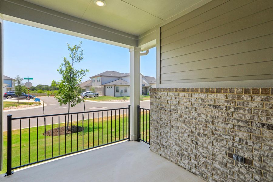 Covered porch featuring a residential view Covered porch featuring a residential view