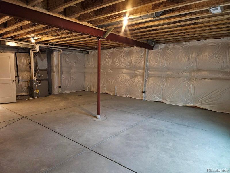 In-progress construction of a new home in The Cottages Collection at Ridgeline Vista, Brighton, CO (Image 22).