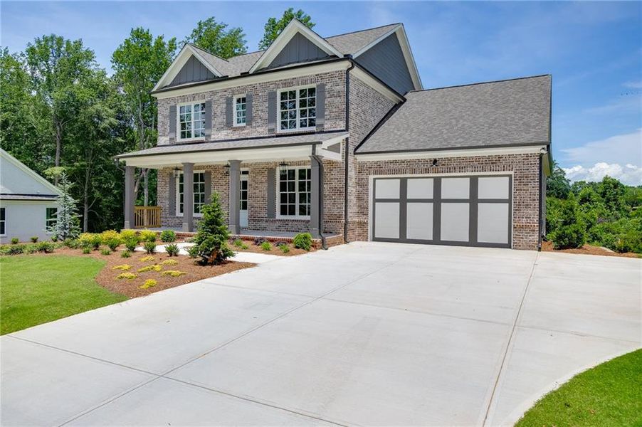 Front exterior of a new home in , Buford, GA, highlighting curb appeal (Image 2). Front exterior of a new home in , Buford, GA, highlighting curb appeal (Image 2).