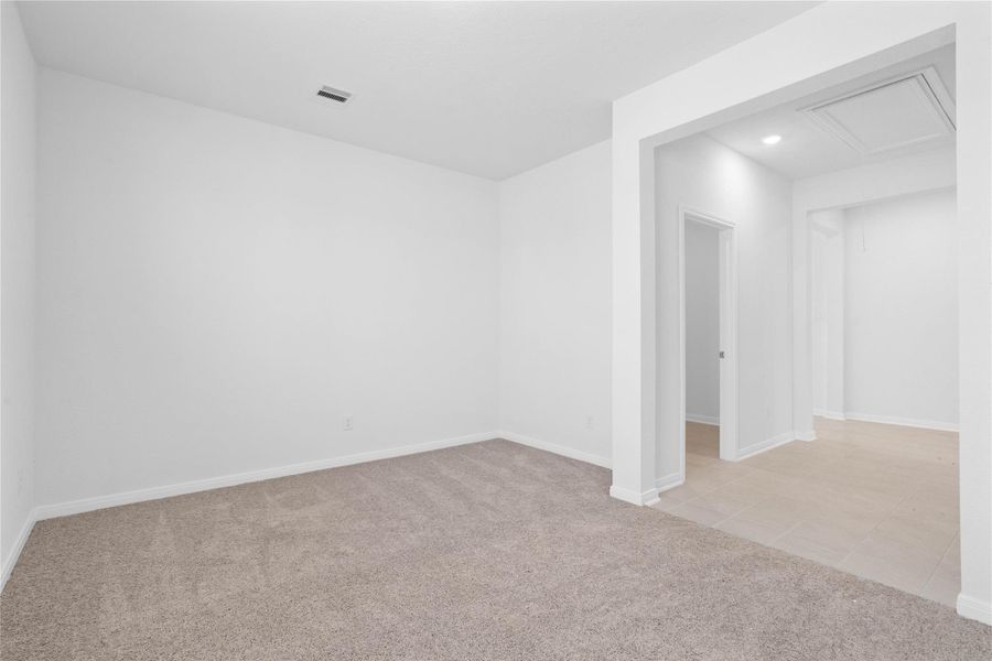 Additional view from the Den into the hallway.