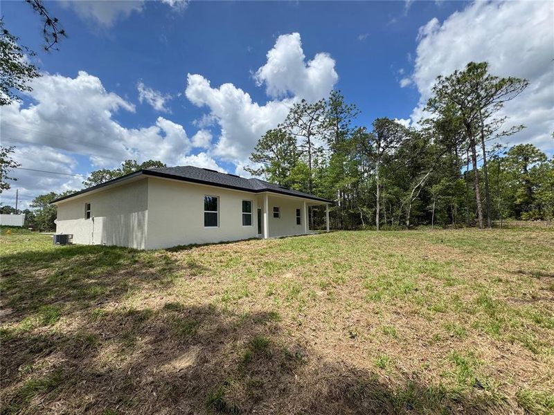 Exterior details and patio area of a home in , Citrus Springs (Image 19).