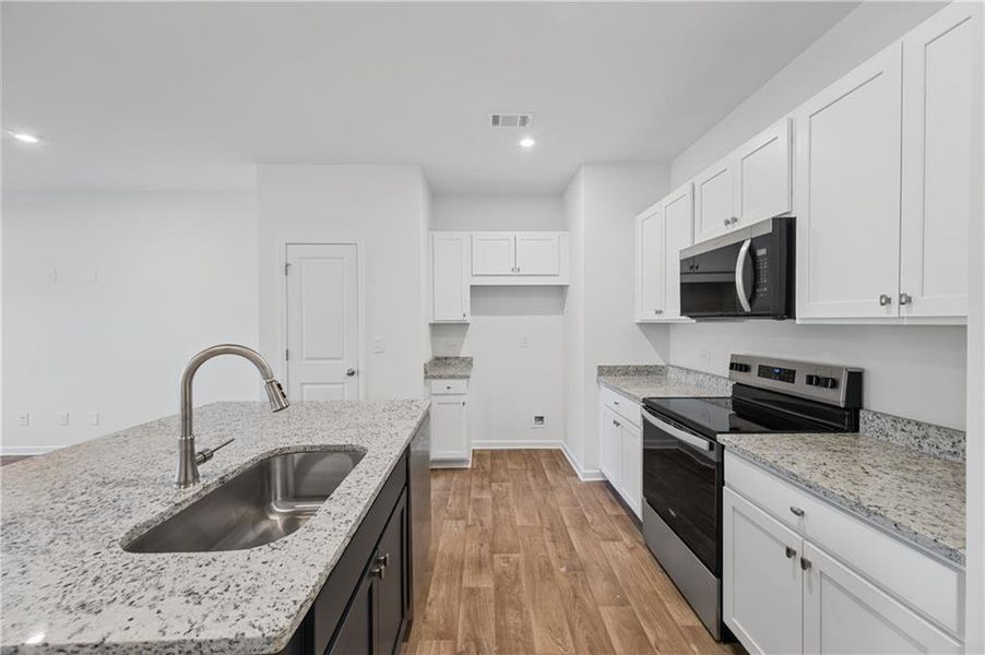 Furnished interior view inside a new home in Village Green, Adairsville (Image 8).
