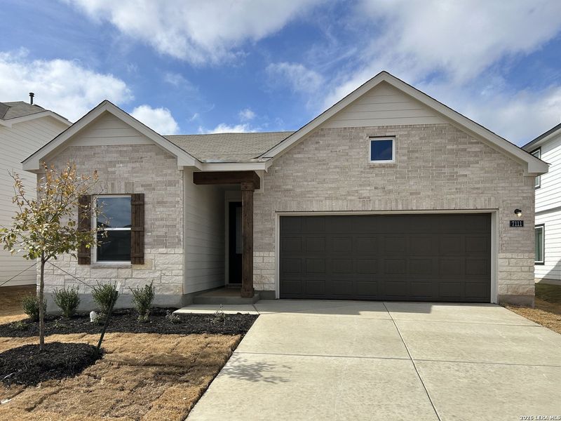 Front exterior of a new home in Hennersby Hollow, San Antonio, TX, highlighting curb appeal (Image 19).