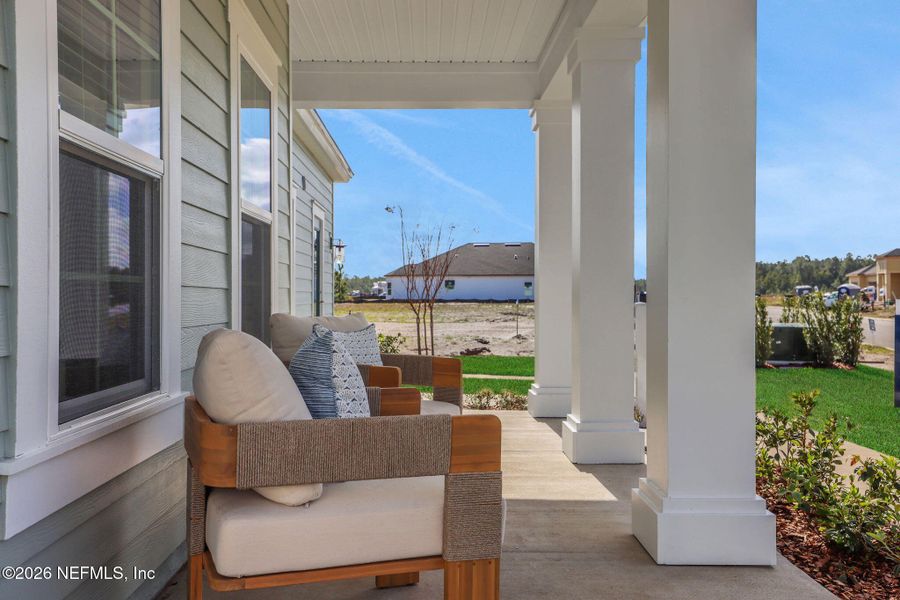 Exterior details and patio area of a home in Seminole Trace, Palm Coast (Image 3).