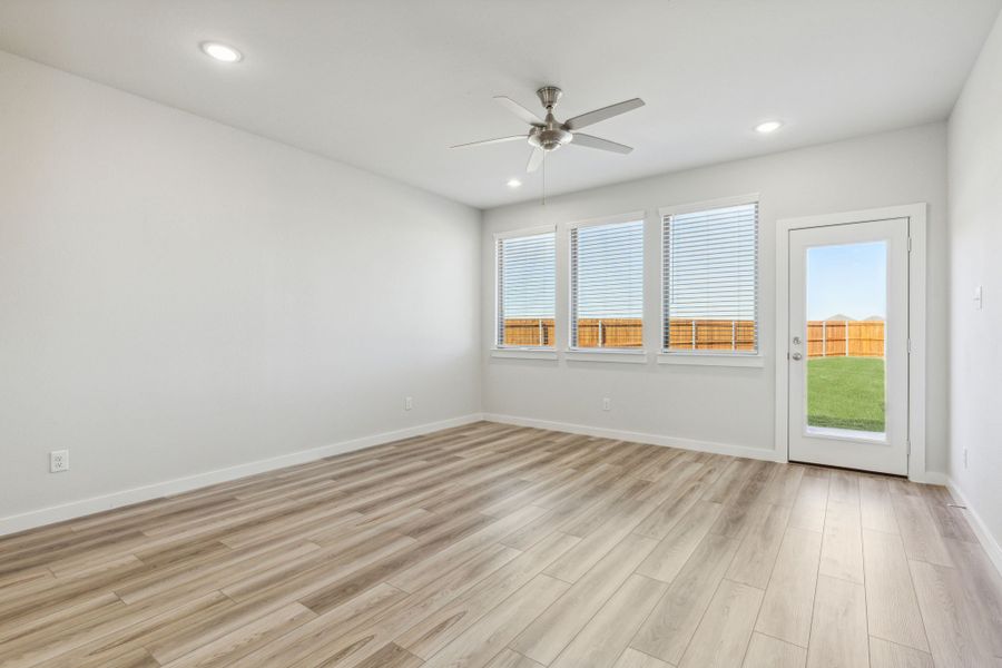 Living Room in the Willow home plan by Trophy Signature Homes – REPRESENTATIVE PHOTO