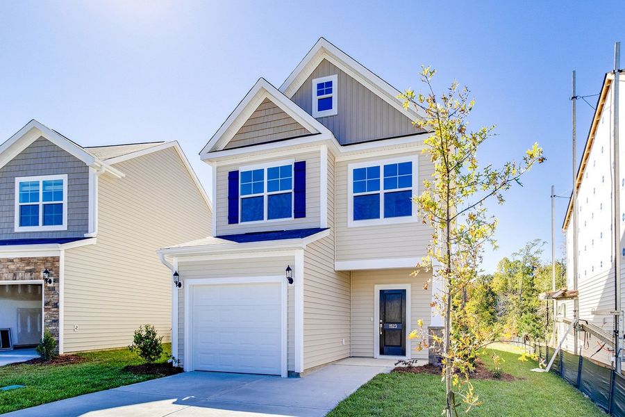 Front exterior of a new home in The Falls, Blythewood, SC, highlighting curb appeal (Image 19).