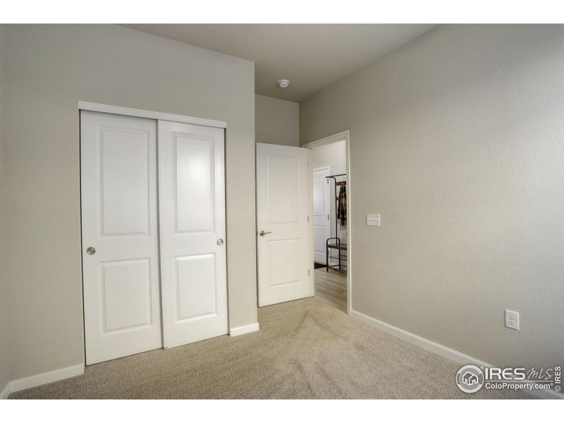 Guest bedroom on main level perfect for guest privacy, or multigenerational living