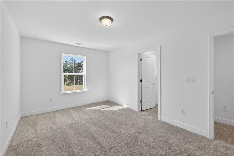 Spacious, unfurnished interior of a new home in Riversprings, Dacula (Image 27).