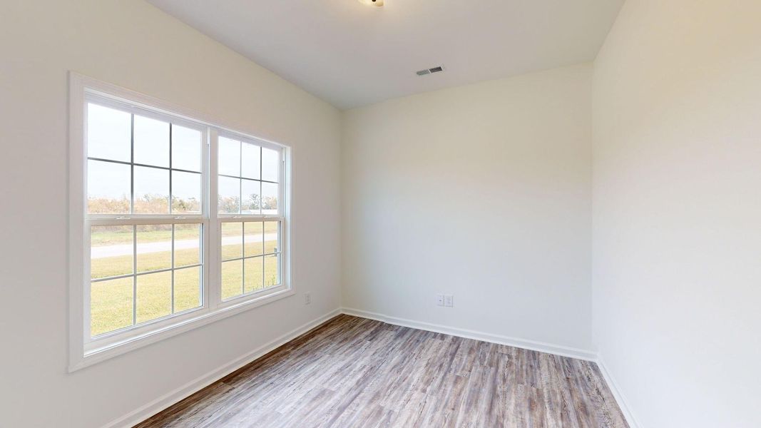 Representative unfurnished interior of a home built from the Yorkshire A by JC Jackson Homes,LLC in Heritage Pointe, Newport (Image 19).