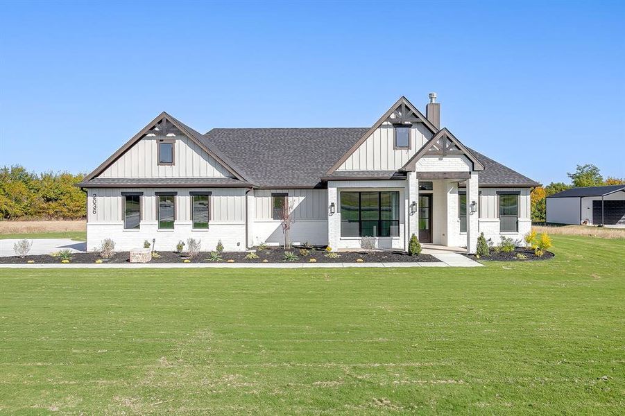 Front exterior of a new home in , Weatherford, TX, highlighting curb appeal (Image 21).