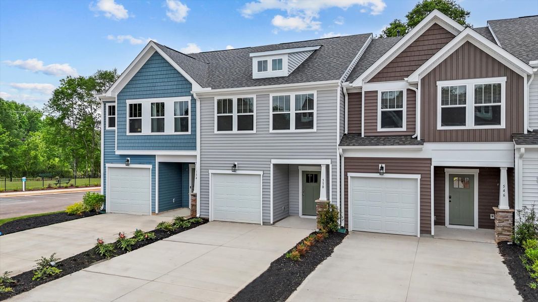 Two story townhome with stone column at Ransdell Pointe by DRB Homes in Spartanburg, SC