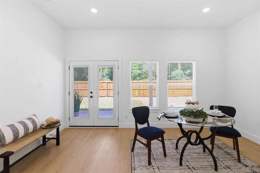 Bright interior space featuring light wood-finish flooring