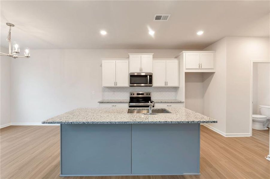 Furnished interior view inside a new home in , Calhoun (Image 14).