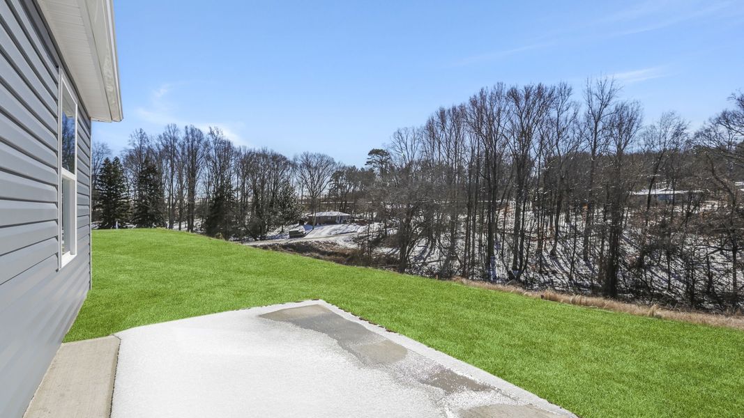 Exterior details and patio area of a home in Village Grove, Greenville (Image 3).