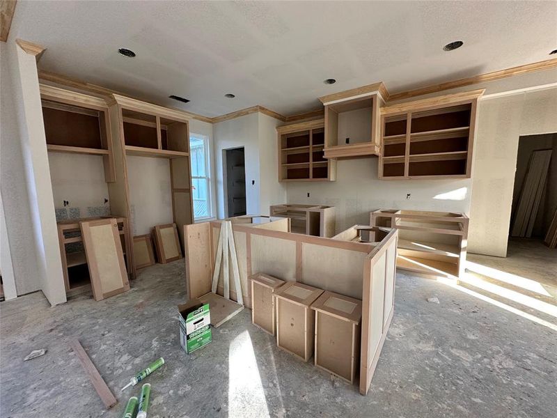 Kitchen featuring ornamental molding