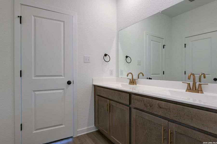 Furnished interior view inside a new home in Nopal Valley, San Antonio (Image 12).