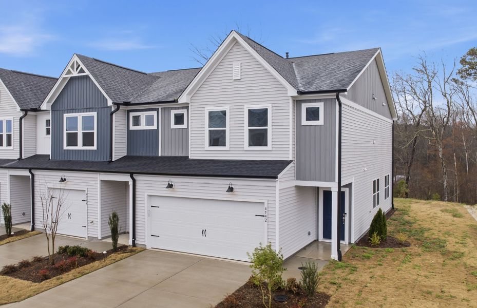 Front exterior of a new home in McConnell Ridge, McLeansville, NC, highlighting curb appeal (Image 17). Front exterior of a new home in McConnell Ridge, McLeansville, NC, highlighting curb appeal (Image 17).