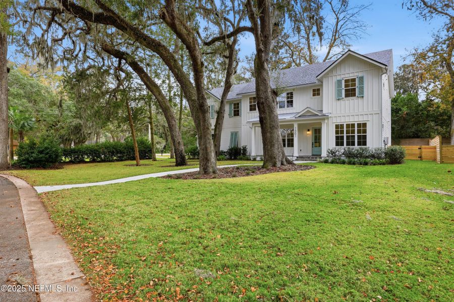Front exterior of a new home in , Neptune Beach, FL, highlighting curb appeal (Image 28). Front exterior of a new home in , Neptune Beach, FL, highlighting curb appeal (Image 28).