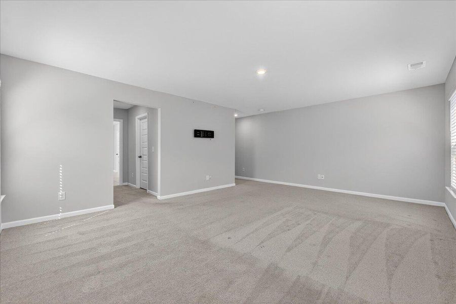 Spacious, unfurnished interior of a new home in Sweetgrass at Summers Corner, Summerville (Image 22).