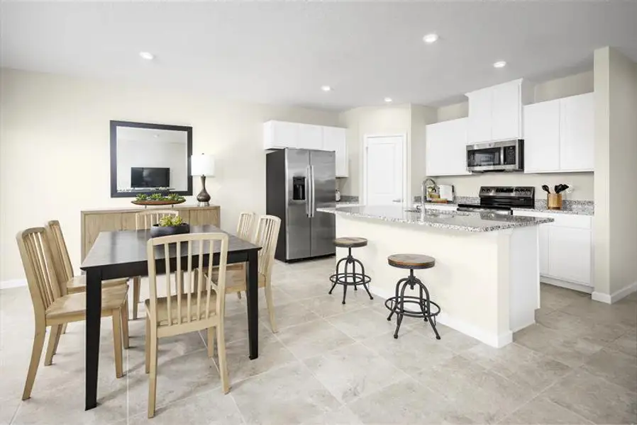 Representative furnished interior of a home built from the Palm by Ryan Homes in Heritage Station, Punta Gorda (Image 3).