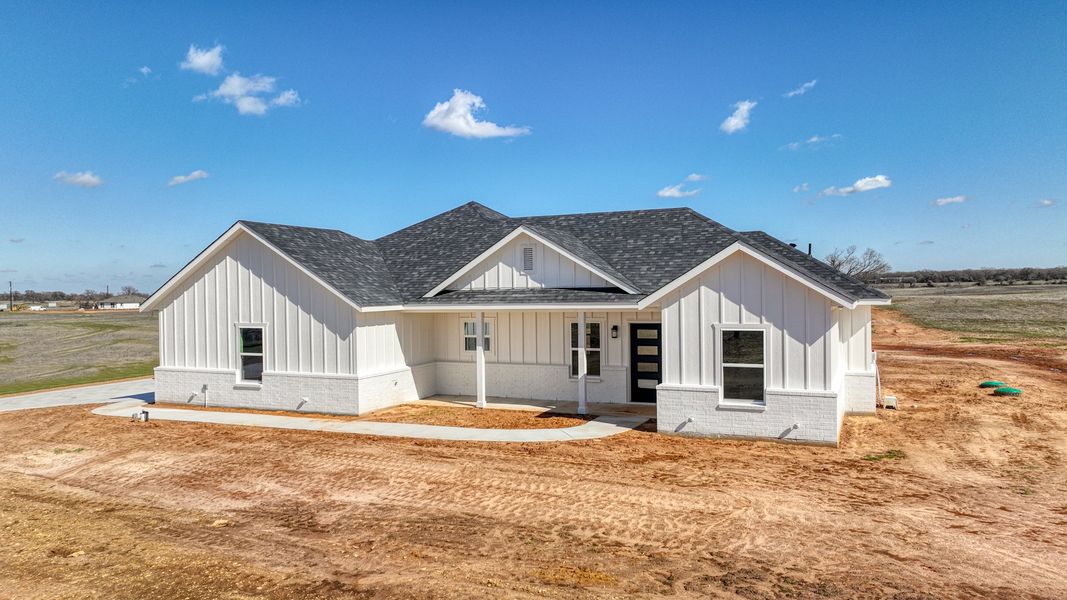 Representative exterior photo of a completed home built from the Lucas by Zeal Home Builders in Echo Grove, Poolville, TX (Image 46).